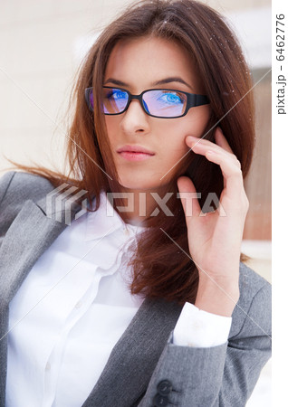 A beautiful young business woman walking outdoors 6462776