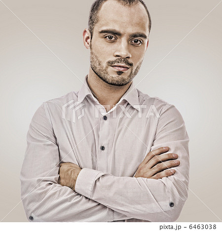 Fashion portrait of adult handsome business man looking at camer 6463038