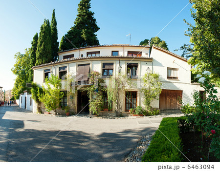 Spanish house with greenery around it. Hotel at Alhambra Spanish house with greenery around it. Hotel at Alhambra 6463094