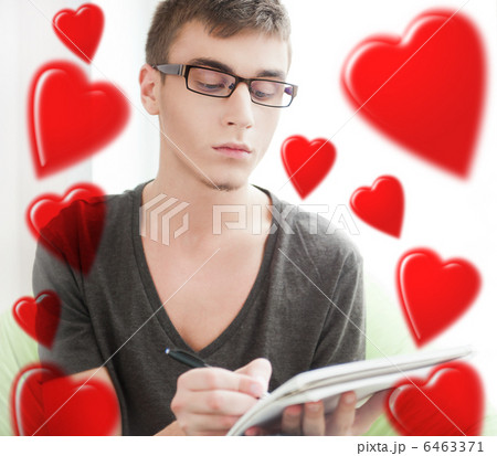 Portrait of attractive young man with hearts flying around him s Portrait of attractive young man with hearts flying around him s 6463371