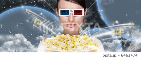 Portrait of young stylish modern woman wearing 3d glasses watchi 6463474
