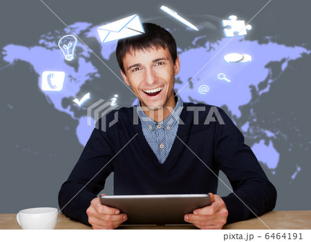 A businessman with icons floating around his head. Portrait of h A businessman with icons floating around his head. Portrait of h 6464191