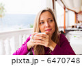 Woman tasting coffee 6470748