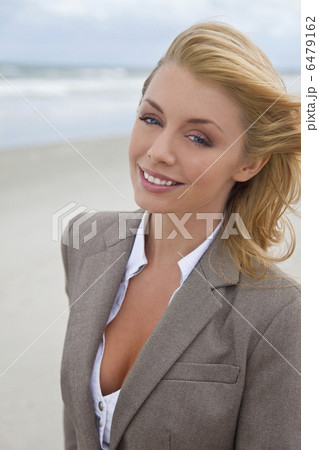 Beautiful Blond Woman At the Beach 6479162