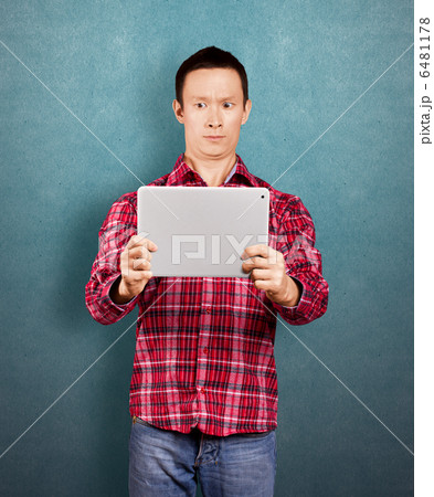 Asian Man With Touch Pad Asian Man With Touch Pad 6481178