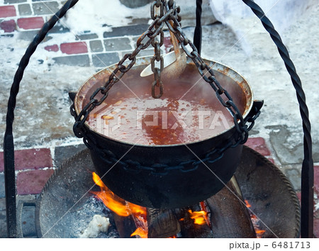 Copper with soup on fire Copper with soup on fire 6481713