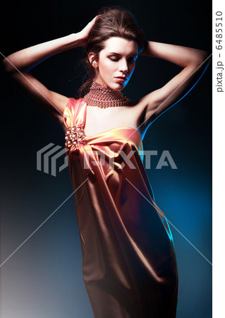 beautiful woman in long dress in blue light 6485510