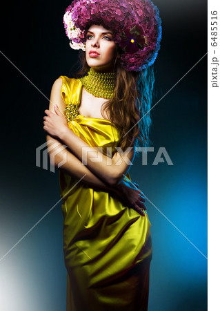 sensual beautiful sexy woman in green dress and flower hat sensual beautiful sexy woman in green dress and flower hat 6485516
