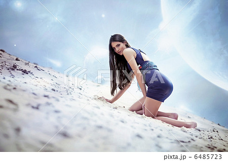 Sexual woman in dress on the cosmic beach 6485723