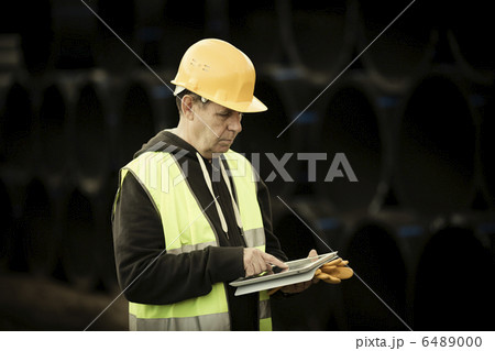 construction worker using digital tablet 6489000