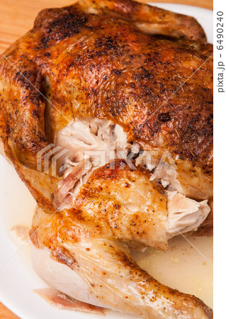 roast chicken on white plate and wooden 6490240