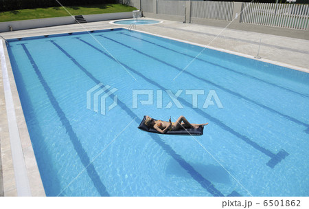 beautiful woman relax on swimming pool beautiful woman relax on swimming pool 6501862