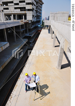 Team of architects on construciton site Team of architects on construciton site 6506981