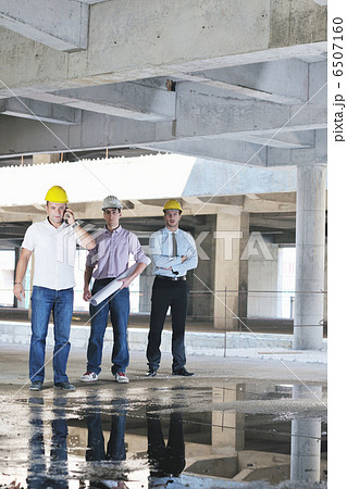 Team of architects on construciton site Team of architects on construciton site 6507160