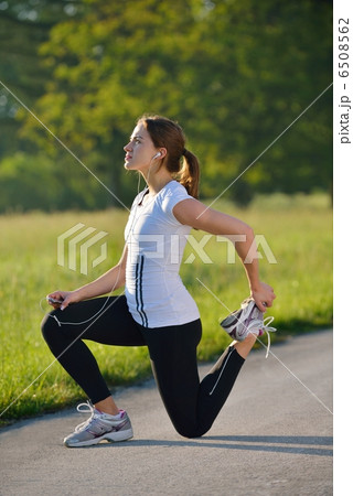 woman stretching before fitness woman stretching before fitness 6508562