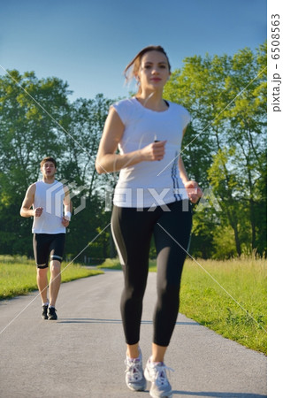 Young couple jogging at morning Young couple jogging at morning 6508563