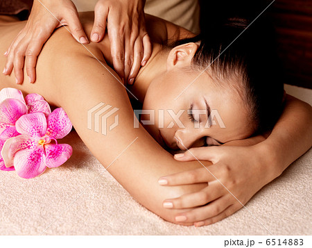 Woman having massage in the spa salon 6514883