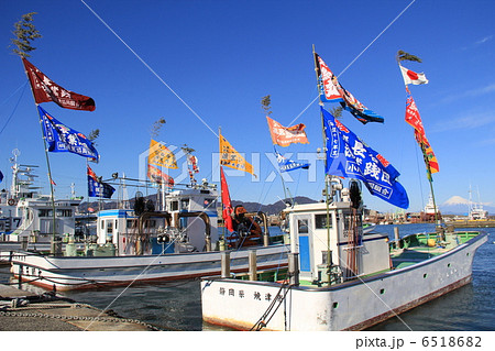 A fishing boat holding a big catch flag - Stock Photo [6518682
