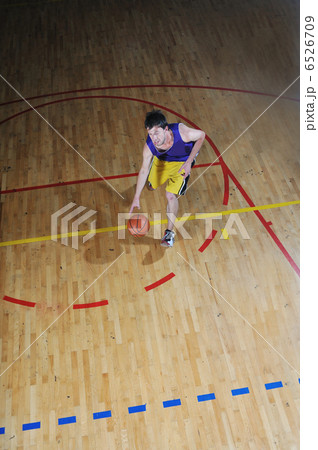 basket ball game player at sport hall basket ball game player at sport hall 6526709