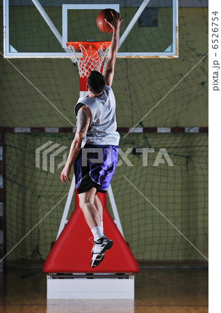 basket ball game player at sport hall basket ball game player at sport hall 6526754