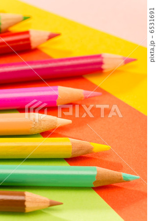 Color pencils on colorful papers close-up Color pencils on colorful papers close-up 6531691