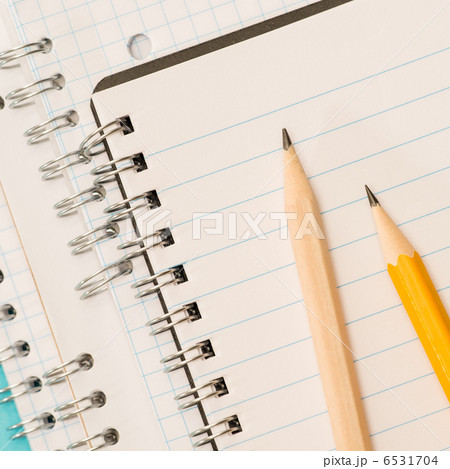School accessories sharp pencils laying on notepad 6531704