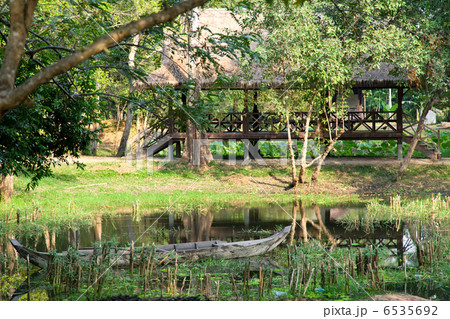 Wooden boat on the lake in asian forest Wooden boat on the lake in asian forest 6535692