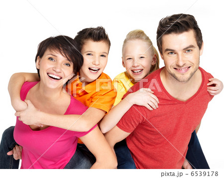 Happy family with two children on white Happy family with two children on white 6539178