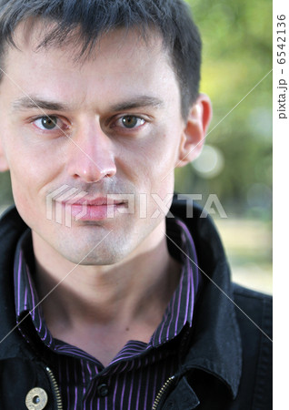 happy young casual man outdoor portrait posing 6542136