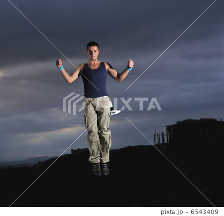 young man dancing and jumping young man dancing and jumping 6543409