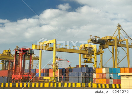 container ship leaving the container port terminal 6544076