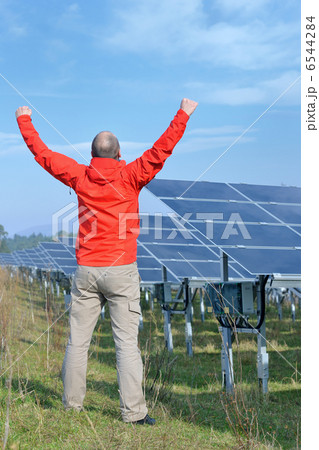 Male solar panel engineer at work place Male solar panel engineer at work place 6544284