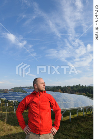 Male solar panel engineer at work place 6544285