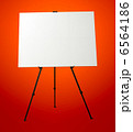 Blank Canvas on Easel Stand. Art Studio Empty Background 6564186