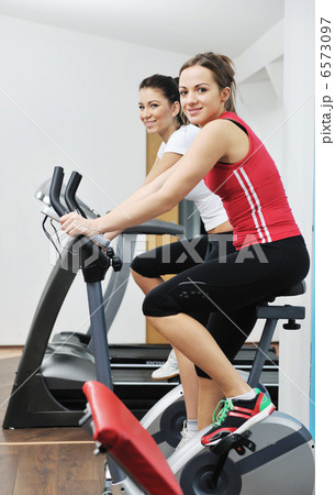 woman workout in fitness club on running track 6573097