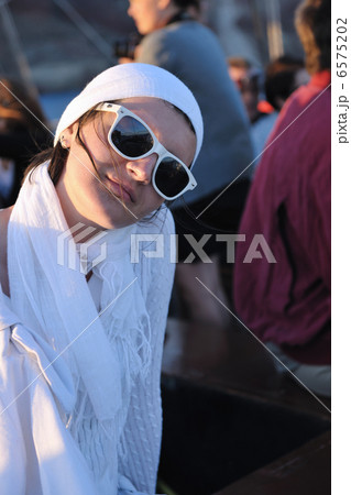 Greek woman on the streets of Oia, Santorini, Greece 6575202