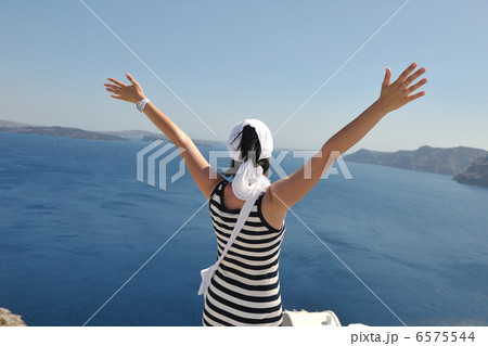 Greek woman on the streets of Oia, Santorini, Greece 6575544