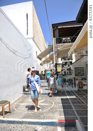 Greek woman on the streets of Oia, Santorini, Greece 6575591