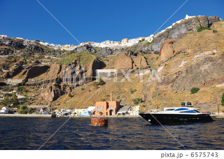 santorini island coast with luxury yacht 6575743