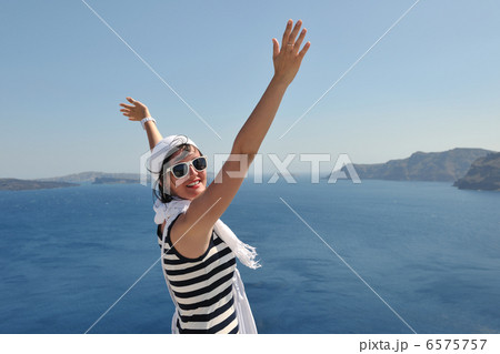 Greek woman on the streets of Oia, Santorini, Greece 6575757