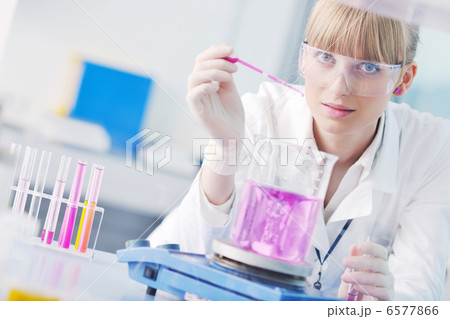 research and science people in labaratory research and science people in labaratory 6577866