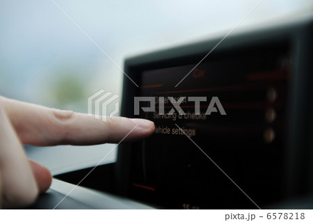 man using car navigation man using car navigation 6578218