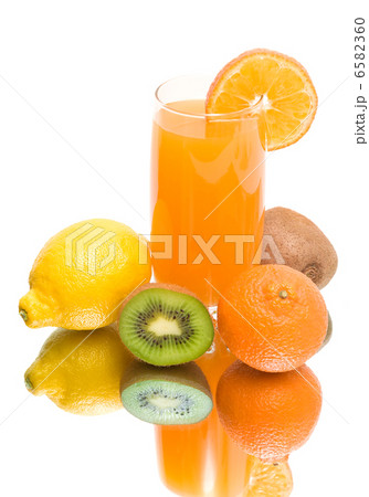 juice and fresh fruit on a white background 6582360