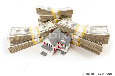 Stacks of Hundreds of Dollars with Small House Stacks of Hundreds of Dollars with Small House 6601500
