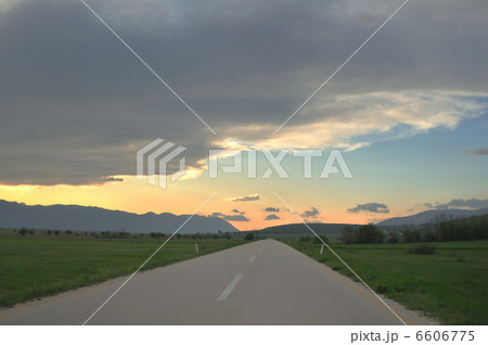 countryroad adventure with beautiful sunset 6606775