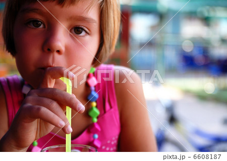 Cute little gilr enjoying cold drink Cute little gilr enjoying cold drink 6608187
