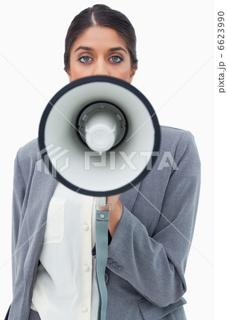 Businesswoman using megaphone Businesswoman using megaphone 6623990