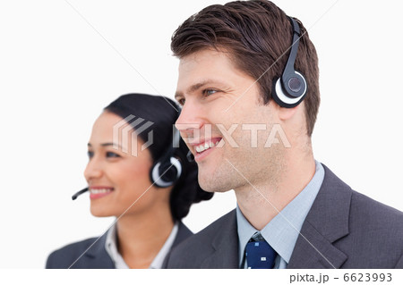 Close up of smiling call center team Close up of smiling call center team 6623993