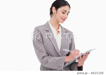 Businesswoman taking notes Businesswoman taking notes 6625189