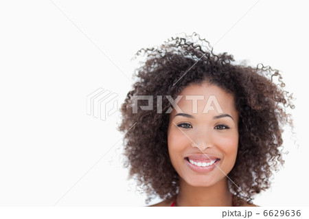 Smiling woman looking straight at the camera Smiling woman looking straight at the camera 6629636